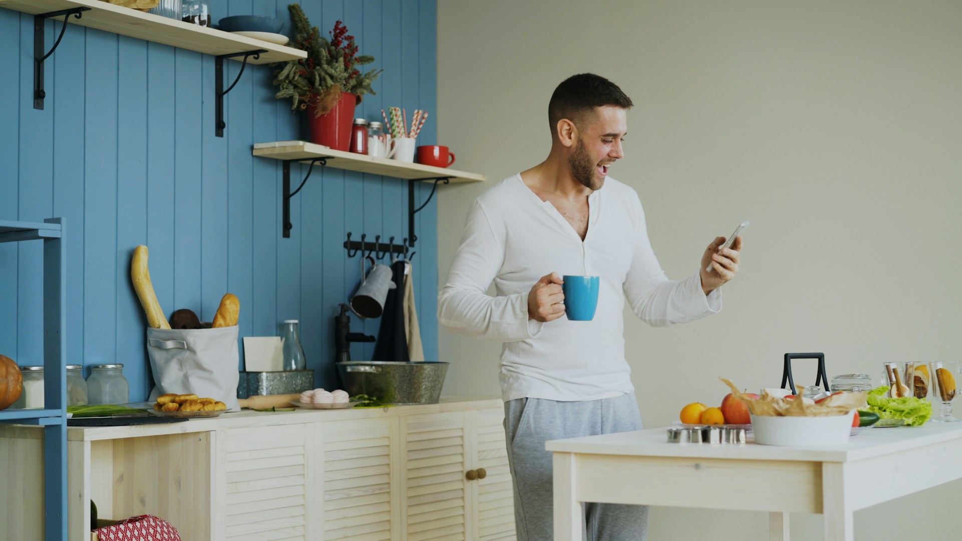 Tradesperson checking a booking confirmation on his phone